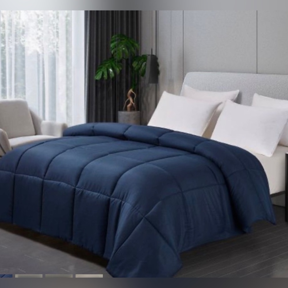 Navy Full/Queen down alternative microfiber comforter 88”x88”. Fill weight 40oz.